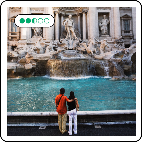 Image description: Two people looking at a water fountain. Five review bubbles are on the upper left corner.